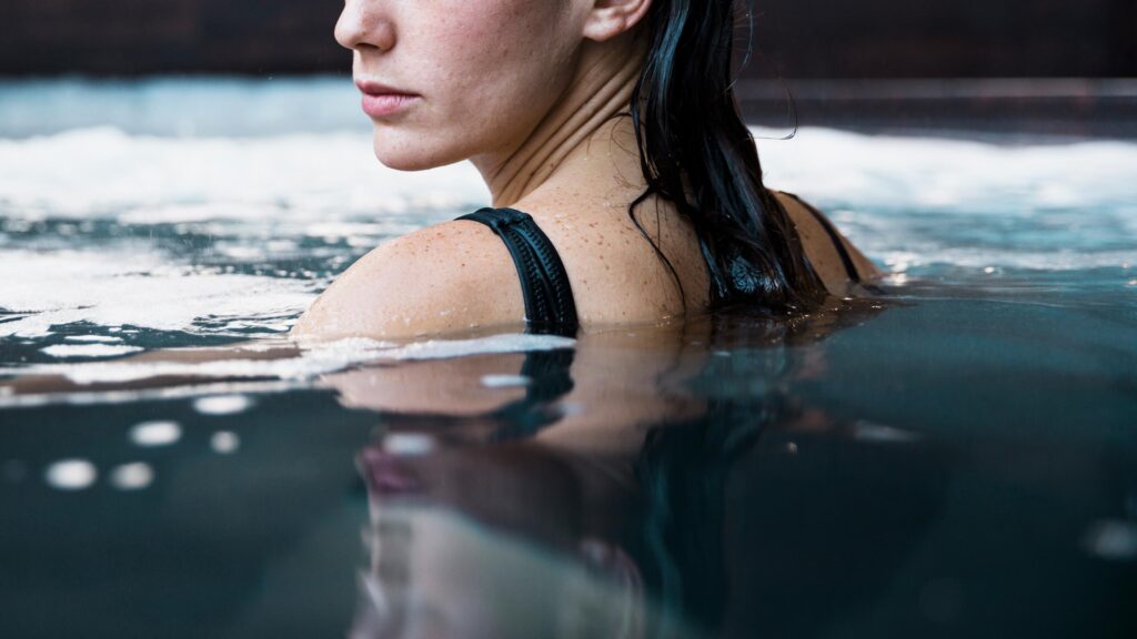 close up of women in a pool